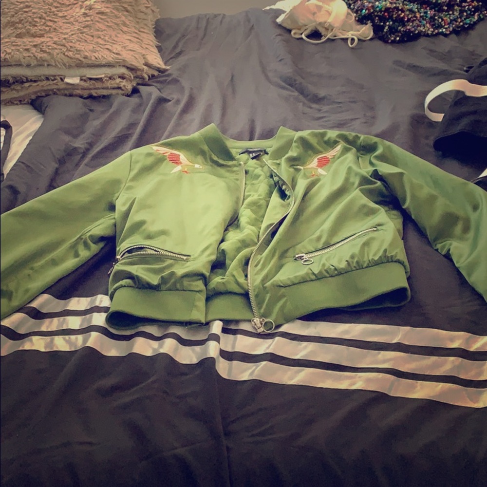 A green crop jacket